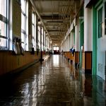 Image of an empty school hallway. Photo courtesy of Kyo Azuma on Unsplash