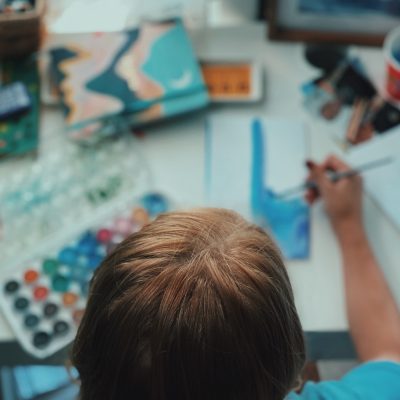 a young child painting