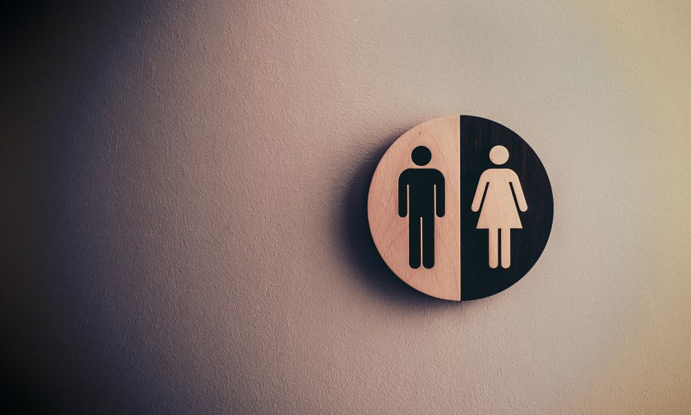 Men and womens bathroom sign