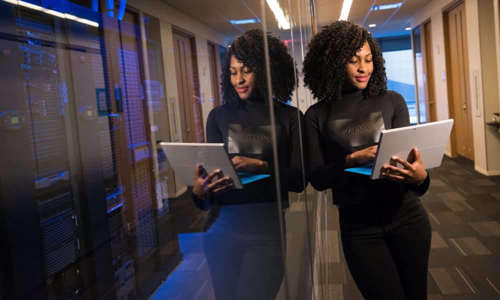 Image of black women doing work- Image courtesy of Christina on Unsplash