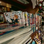 Image of manga books in bookshelf-Image courtesy of Eduardo on Unsplash