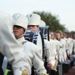 Photo of a marching band. Photo courtesy of Katrina Berban on Unsplash.