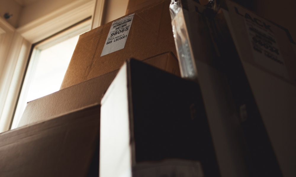 Stacked boxes. Photo courtesy of Matthew Hamilton on Unsplash.