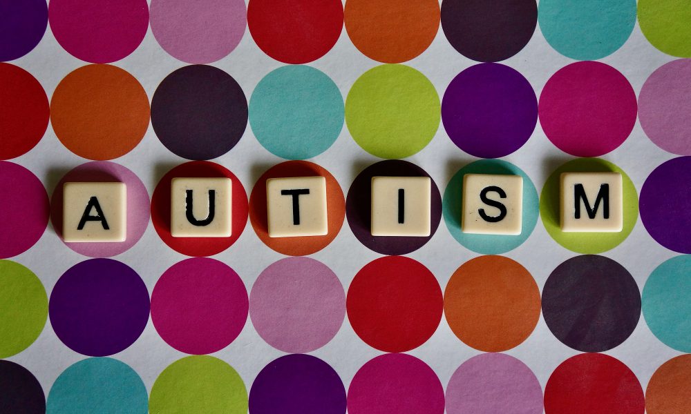 Photo of letters spelling out the word autism. Photo courtesy of Peter Burdon on Unsplash.