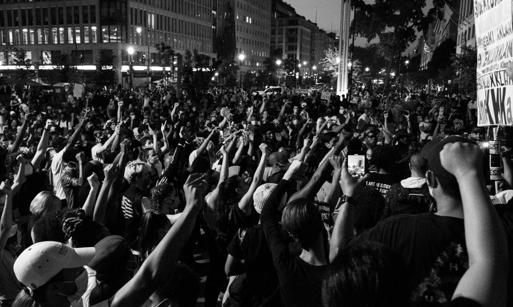 Photo of Black Protests courtesy of Koshu Kunii on Unsplash