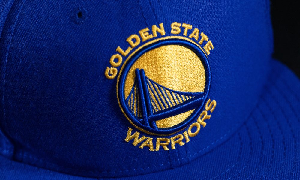 Photo of a Golden State Warriors hat. Photo courtesy of Mick Haut on Unsplash.