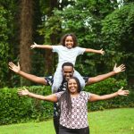Photo of a family posing. Photo courtesy of sarugue Igbinoba on Unsplash.