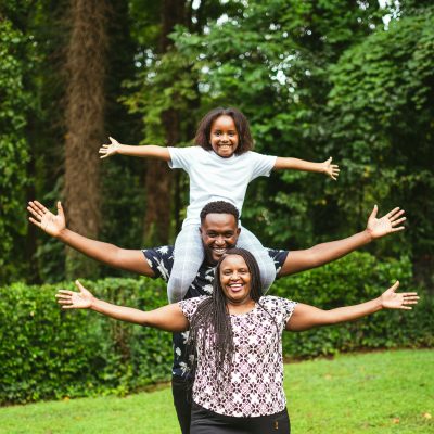 Photo of a family posing. Photo courtesy of sarugue Igbinoba on Unsplash.