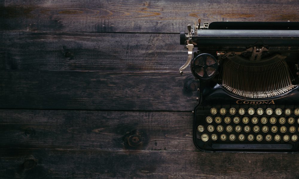 Image of a type writer. Photo courtesy of Patrick Fore on Unsplash