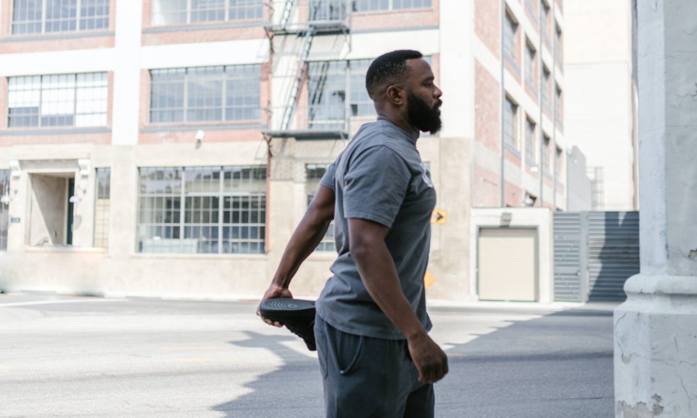 Photo of man stretching. Photo courtesy of RDNE Stock project on Pexels.