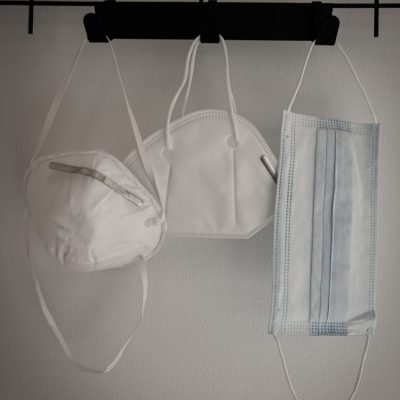 Photo of Covid masks. Photo courtesy of Isaac Quesada on Unsplash.