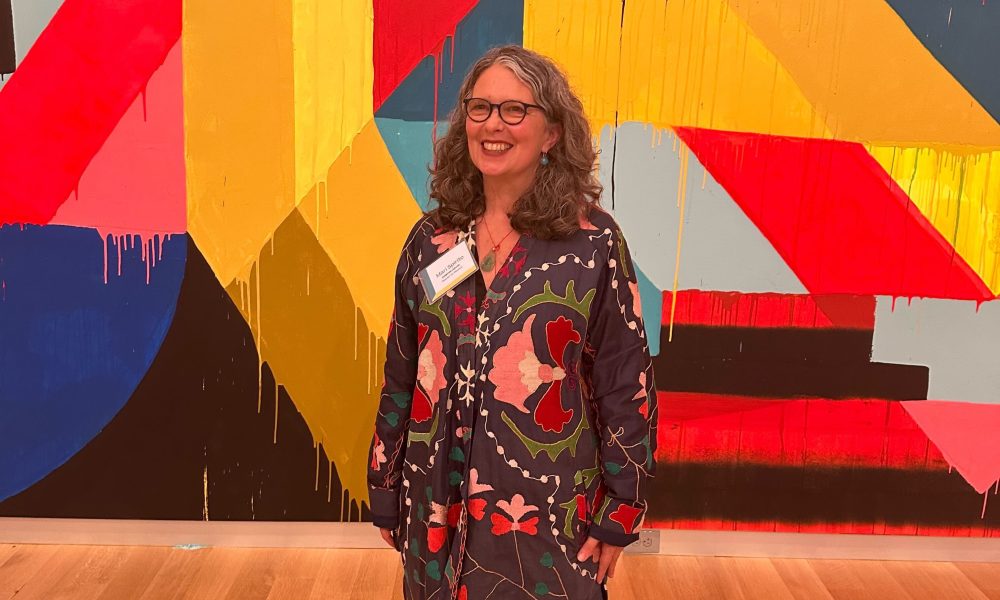 Photo of Mari Spirito standing. Photo courtesy of Ella Verinder.