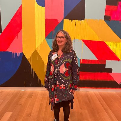 Photo of Mari Spirito standing. Photo courtesy of Ella Verinder.