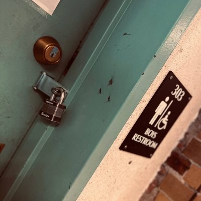 Photo of the boys bathroom at Boston Latin Academy with a lock on it. Photo courtesy of the author.