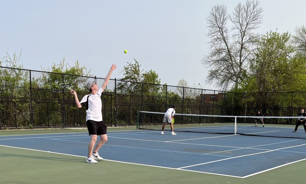 Photo of the author playing tennis. Photo courtesy of the author.