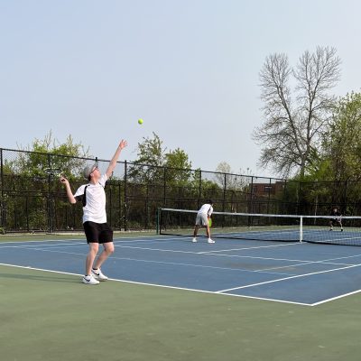 Photo of the author playing tennis. Photo courtesy of the author.
