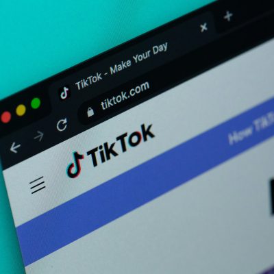 A computer screen with the word tiktok on it. Photo courtesy of Solen Feyissa on Unsplash.