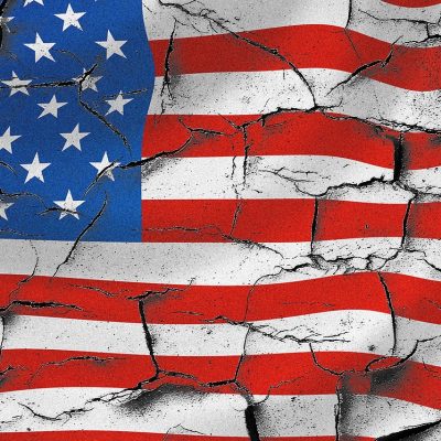 Photo of a cracking American flag. Courtesy of pexels.