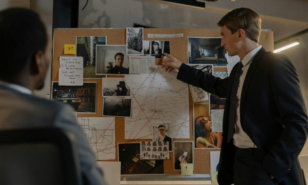 Photo by cottonbro studio: https://www.pexels.com/photo/detectives-looking-at-evidences-on-cork-board-8369522/