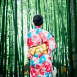 Woman wearing a kimono in the forest. Photo courtesy of Lan Pham on Unsplash.