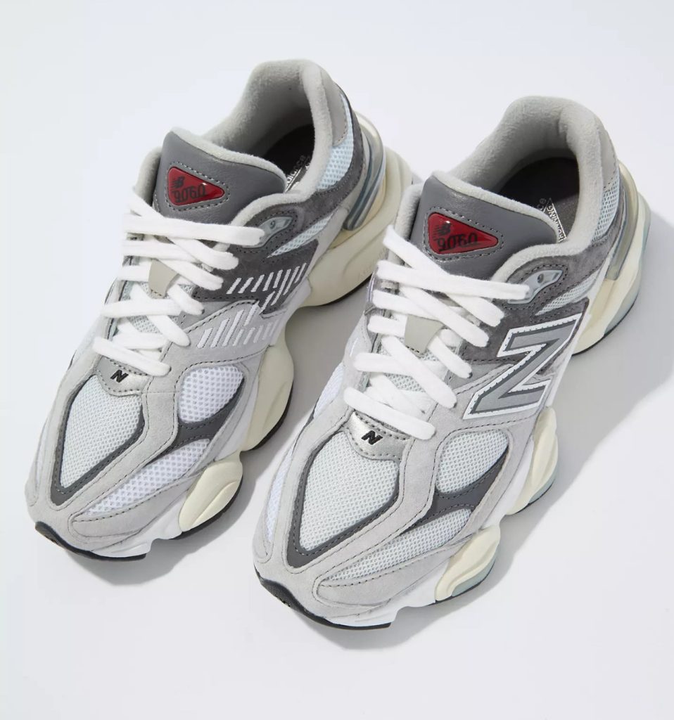 Image of classic white, grey, and black New Balance shoes