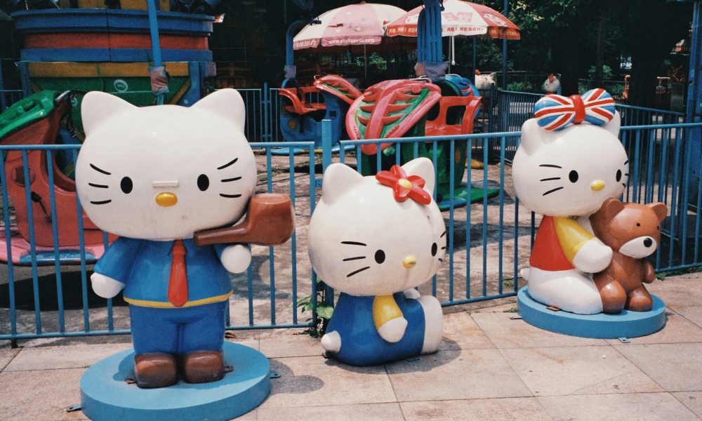 Photo of three Hello Kitty statues courtesy of Jiaqi Zhang on Unsplash.
