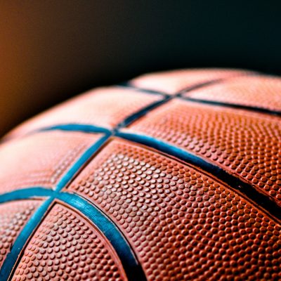 Photo of basketball courtesy of Kylie Osullivan on Unsplash.
