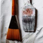 Photo of paint brushes courtesy of Wesley Tingey on Unsplash.
