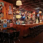 Inside the Delux Cafe. Lots of funky lamps and fun postcards on the walls.