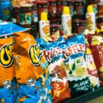 Photo of bags of chips in store. Photo courtesy of Ishaq Robin on Unsplash.